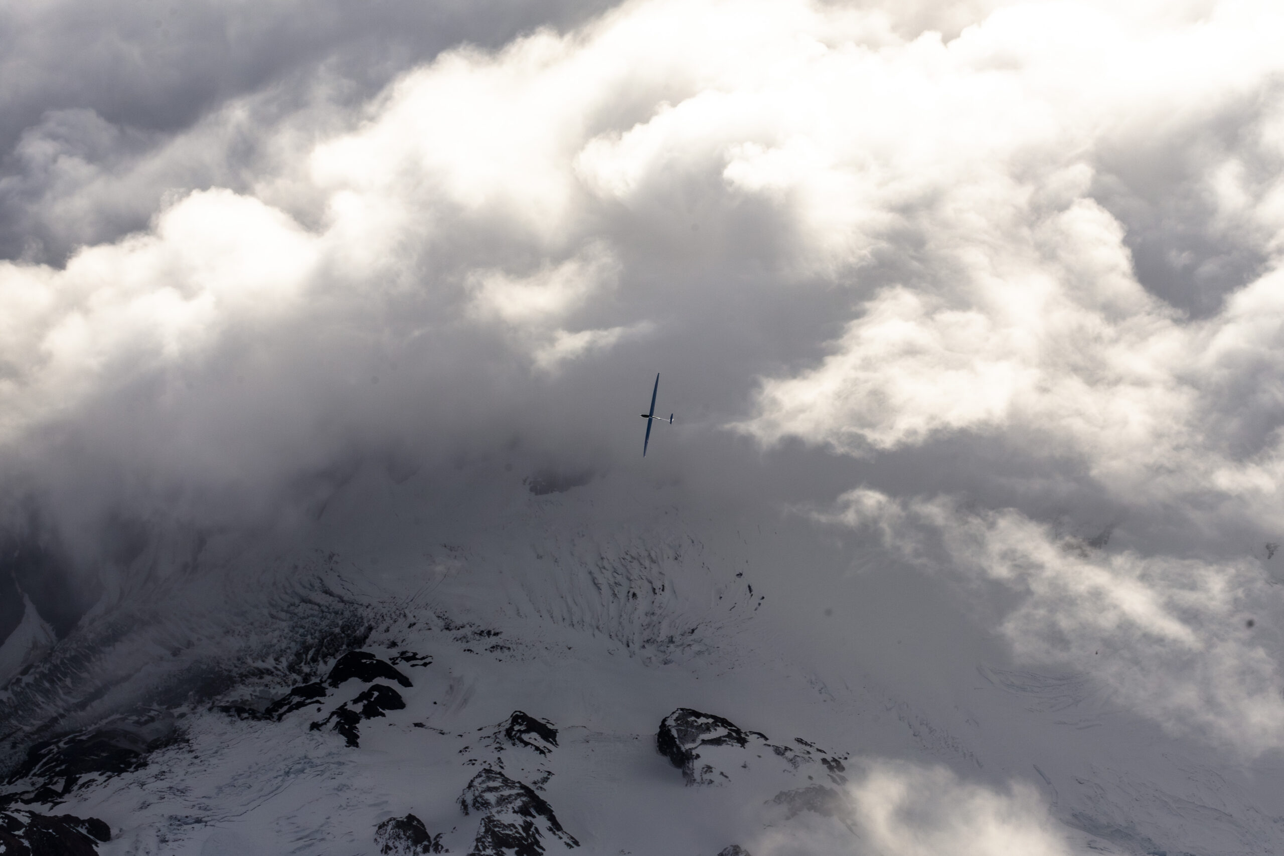 Glider above the Southern Alps and cloud