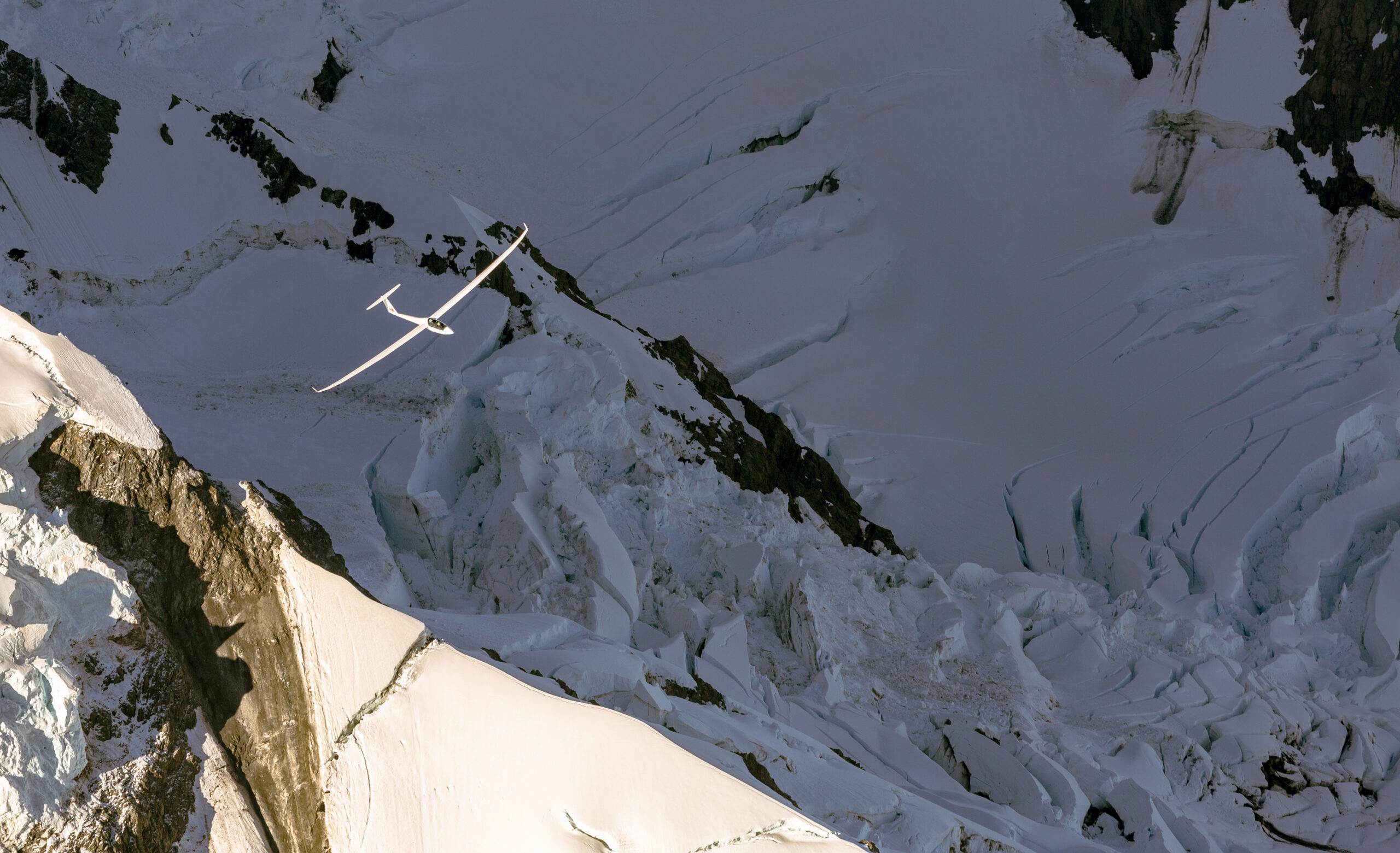 Glider above a Southern Alps glacier